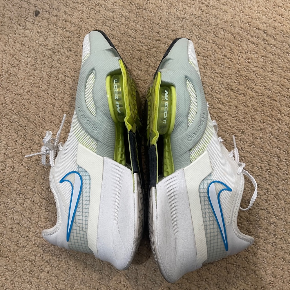 Nike White and Gray Athletic Shoes with Blue Accents
